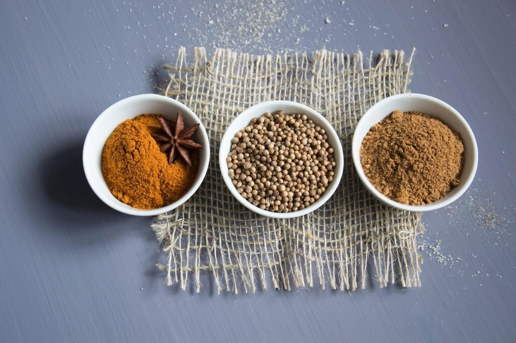 spices, kitchen, ingredients, food, cooking, paprika, pepper, coriander, anise, seeds, nutmeg, powder, scent, seasoning, dark background, kitchen, coriander, coriander, coriander, coriander, coriander, nutmeg, powder